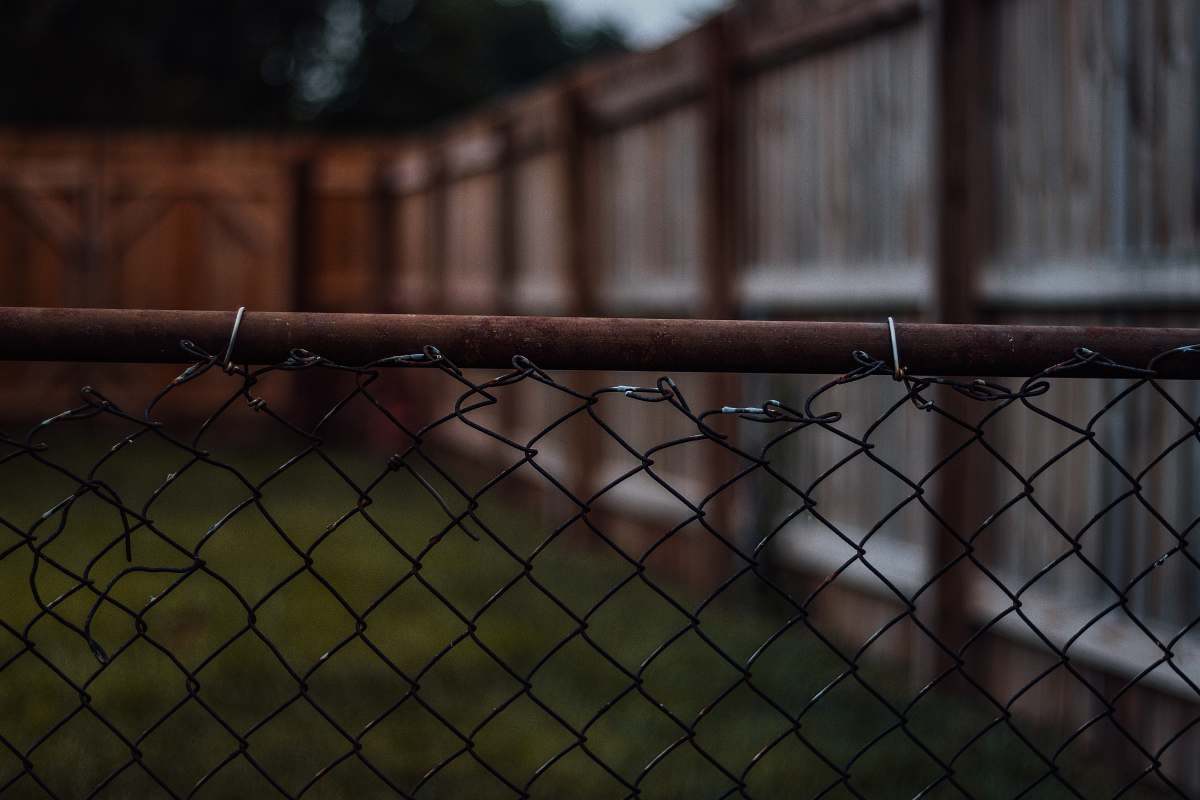 fence gray metal cage huber heights